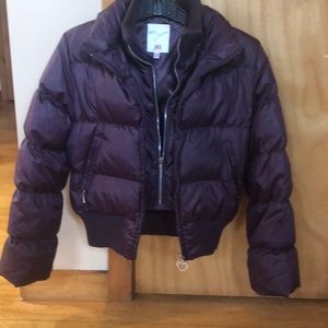 Jennifer Lopez puffy short waisted down jacket.